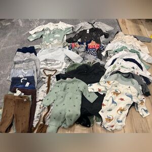 40 pieces of winter 3 month baby clothing.
